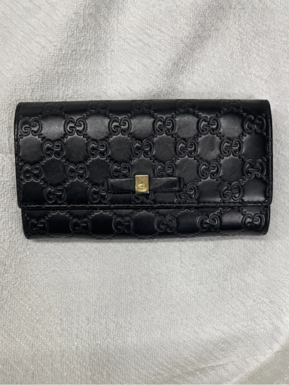 Authentic Gucci Black Guccissima Leather Bow Flap Continental Wallet Gold Detail